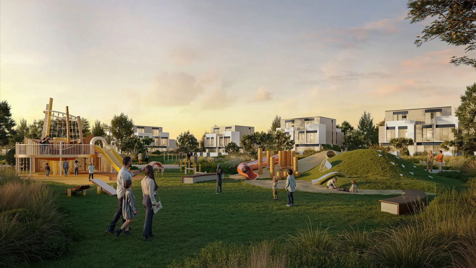 Linear park with a play area and lawns between D-Villas