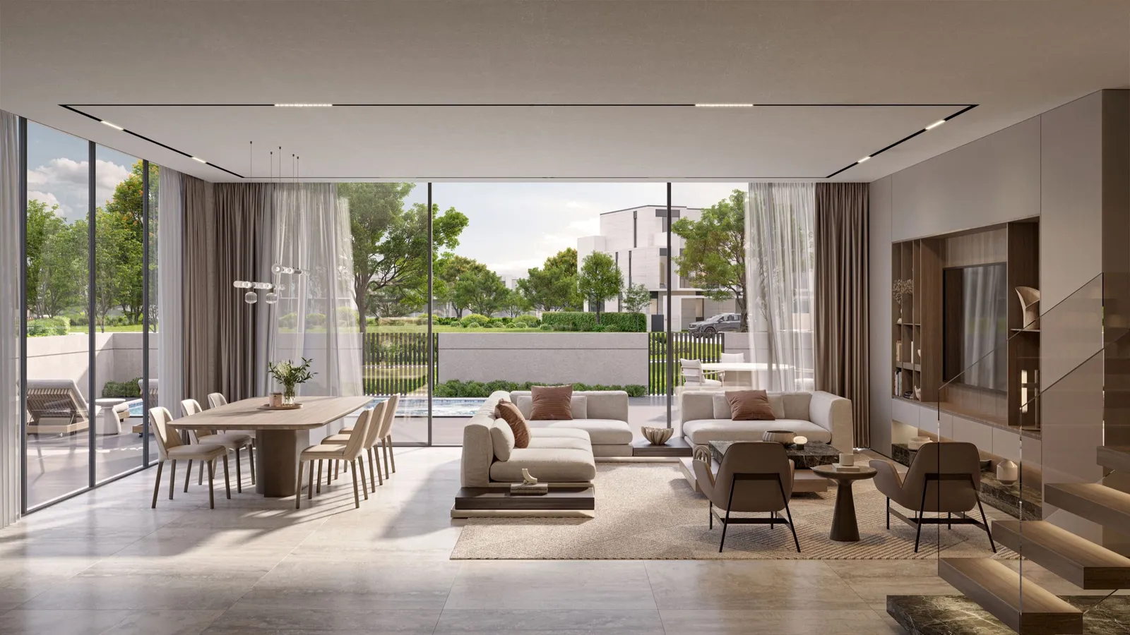 Open-plan living and dining room in a D-Villa with glass doors to the garden