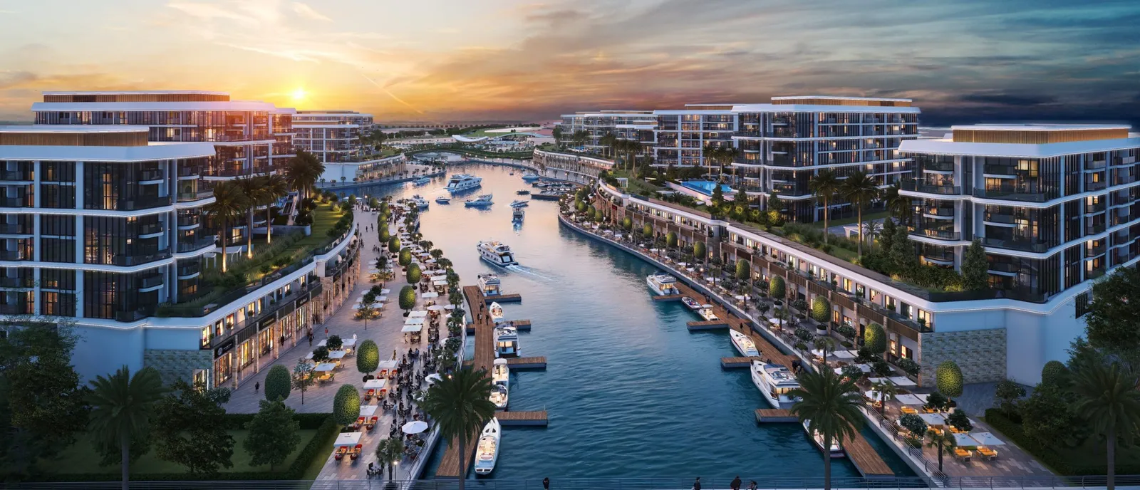 Render of the Marina Residences at Sobha Siniya Island lining a canal marina with moored boats at sunset